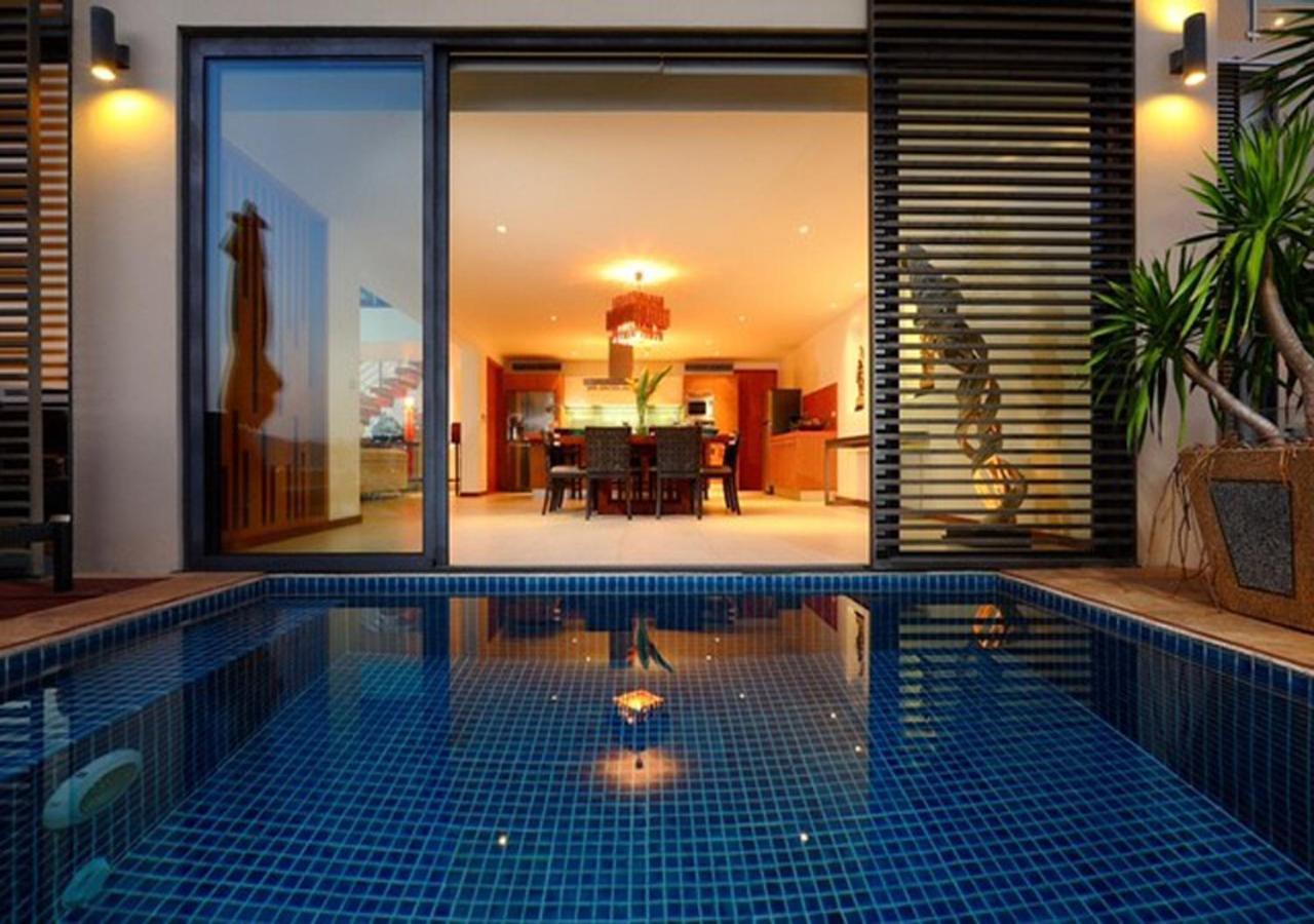 Indochine Resort And Villas - Sha Extra Plus Patong Ngoại thất bức ảnh A pool at the hotel