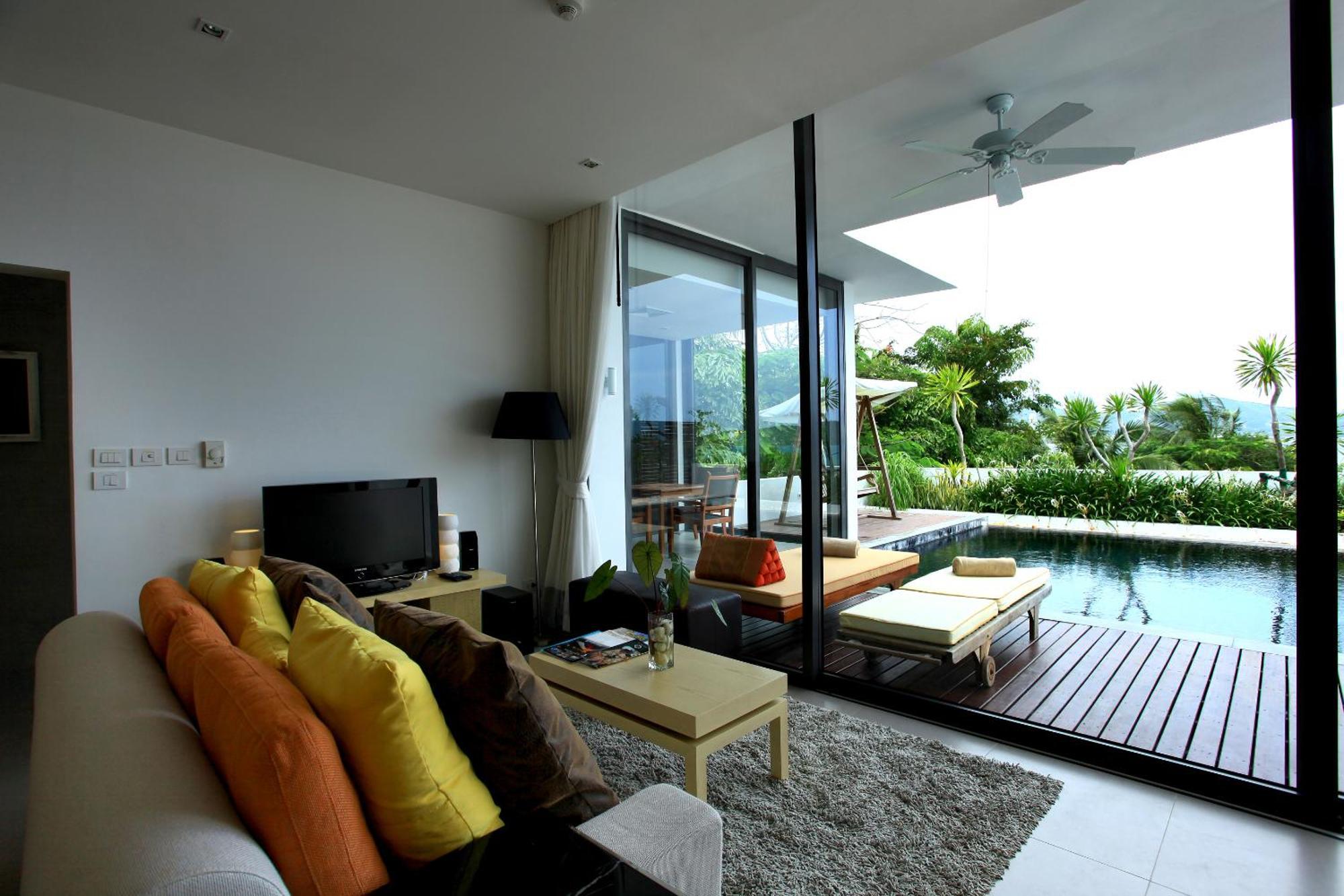 Indochine Resort And Villas - Sha Extra Plus Patong Ngoại thất bức ảnh A living room with a view of the pool