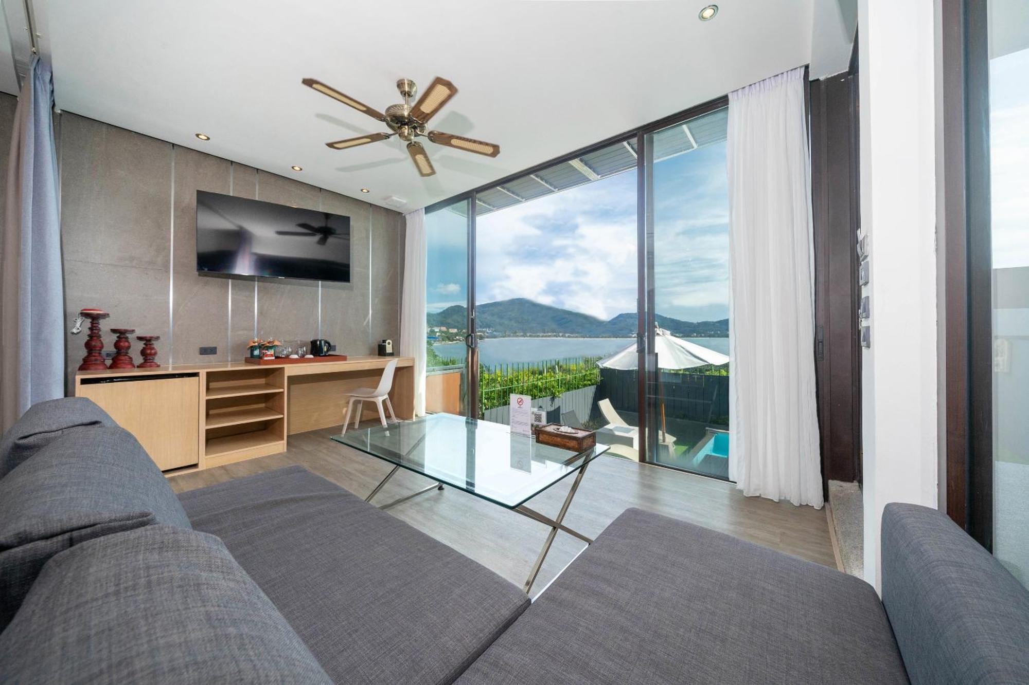 Indochine Resort And Villas - Sha Extra Plus Patong Ngoại thất bức ảnh A living room at the hotel